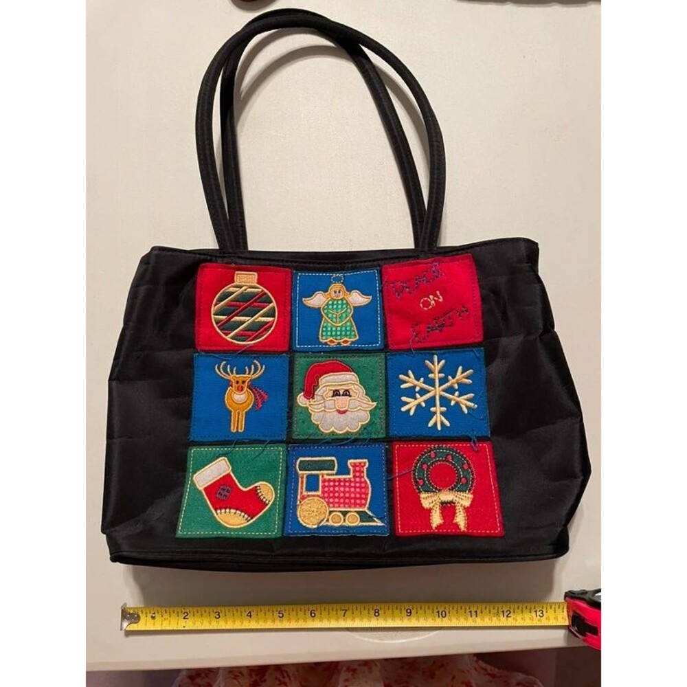 black embroidered holiday shoulder bag by Kim Rogers featuring festive patchwork